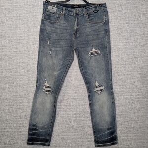 Distressed Blue Jeans